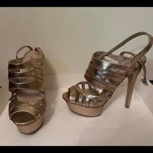 Step Up Your Shoe Game with These Stunning Metallic Pink High Heels